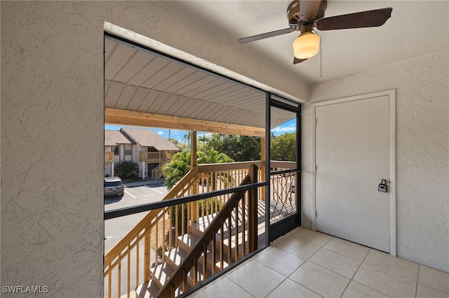 exterior space with ceiling fan