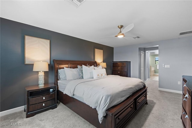 bedroom featuring carpet, connected bathroom, visible vents, and baseboards