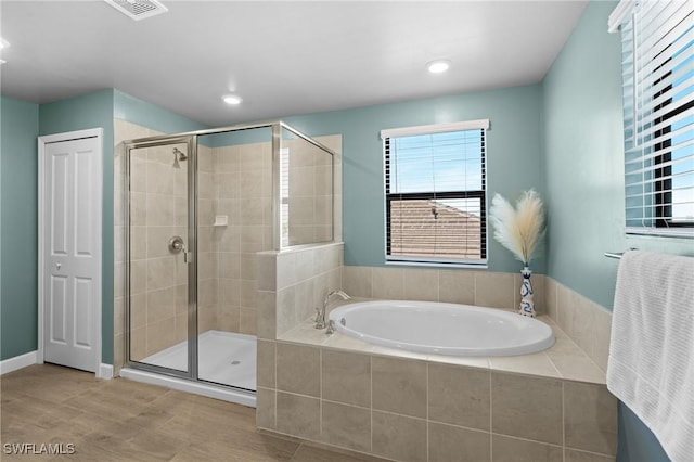 full bath with a stall shower, visible vents, a garden tub, and recessed lighting