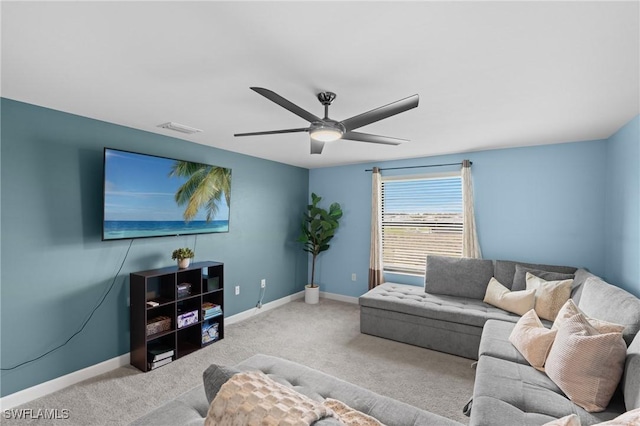 living room featuring carpet, baseboards, and visible vents