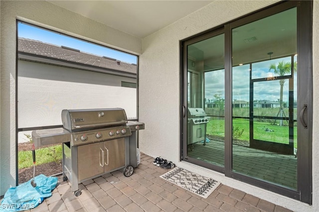 view of patio / terrace with visible vents and grilling area