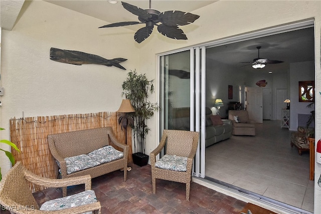 view of patio / terrace featuring ceiling fan