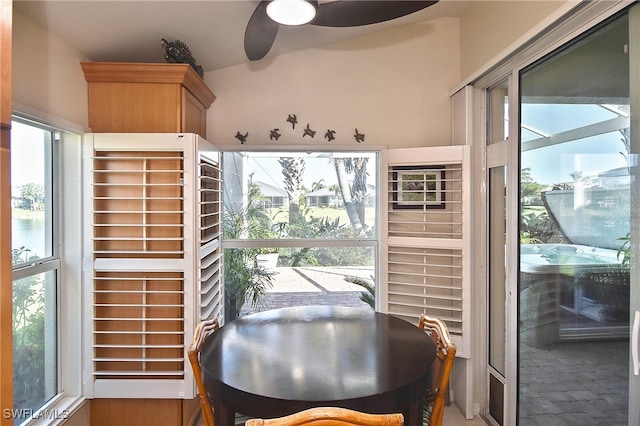 interior space with ceiling fan and plenty of natural light