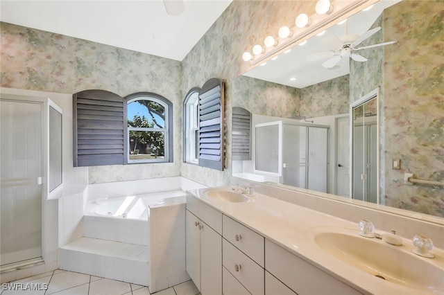 full bathroom featuring a garden tub, a sink, and wallpapered walls