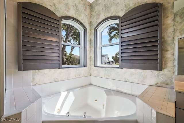 full bathroom featuring a whirlpool tub and wallpapered walls