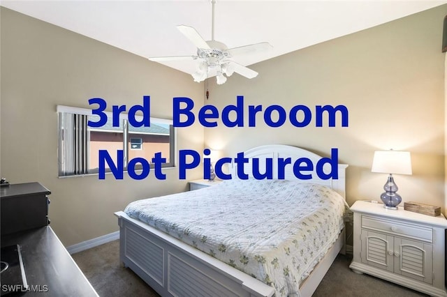 bedroom with ceiling fan, dark colored carpet, and baseboards