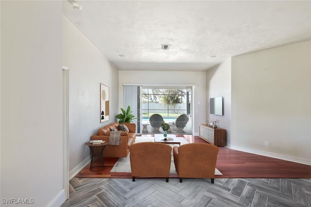 dining area featuring baseboards and visible vents