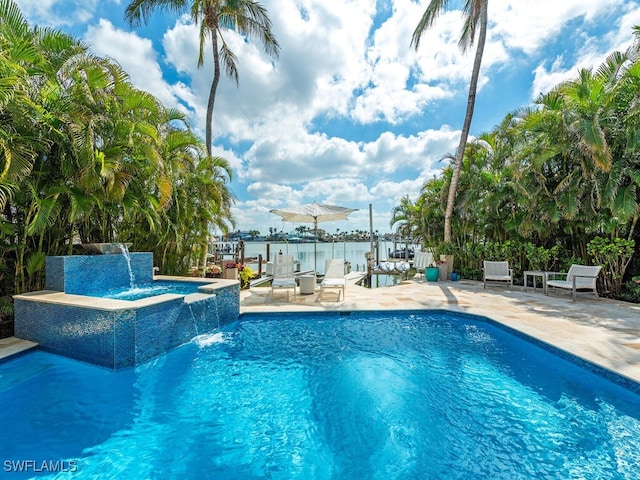 outdoor pool featuring a patio area