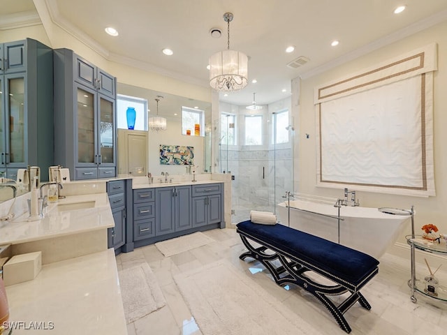 full bath featuring a stall shower, crown molding, a freestanding tub, a sink, and recessed lighting