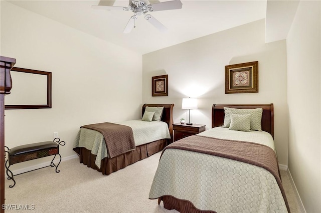 bedroom featuring a ceiling fan, carpet flooring, and baseboards