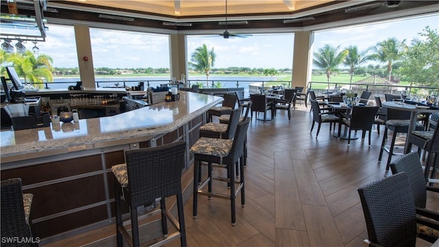 bar with a healthy amount of sunlight and a water view