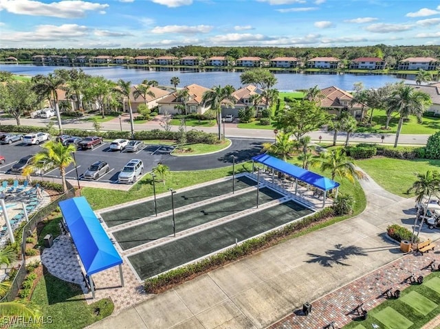 birds eye view of property featuring a water view