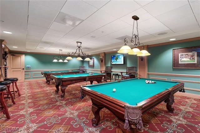 playroom with pool table, ornamental molding, carpet flooring, and wainscoting