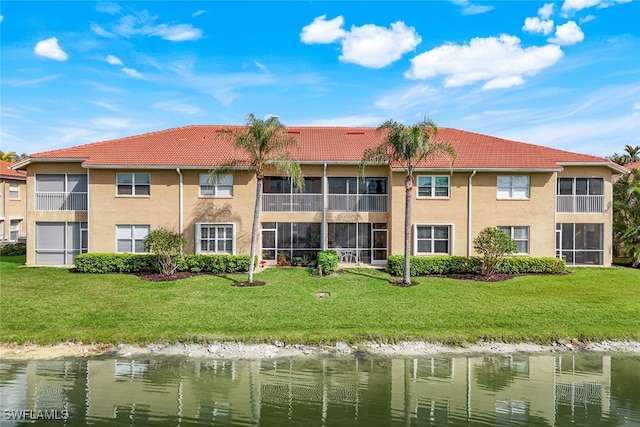 view of building exterior featuring a water view