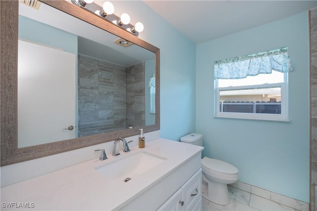 bathroom with visible vents, toilet, marble finish floor, a tile shower, and vanity