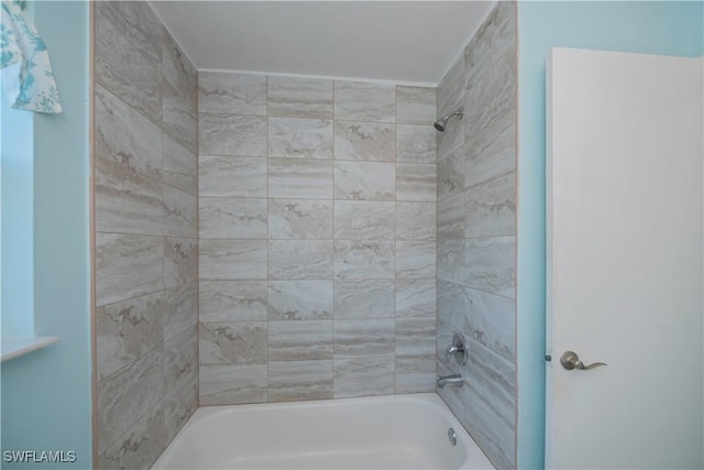 full bath featuring shower / tub combination