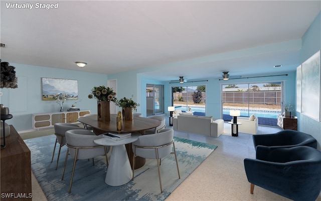 dining room with visible vents and light speckled floor