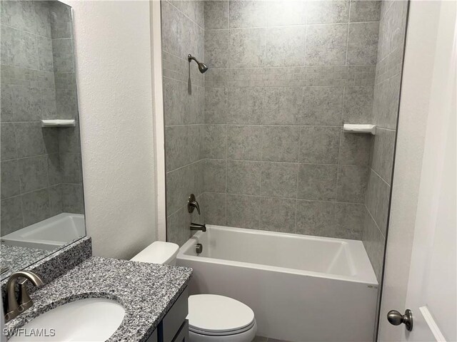2211 Harbour Dr, Punta Gorda, FL 33983 - full bath with toilet, vanity, a textured wall, and tub / shower combination