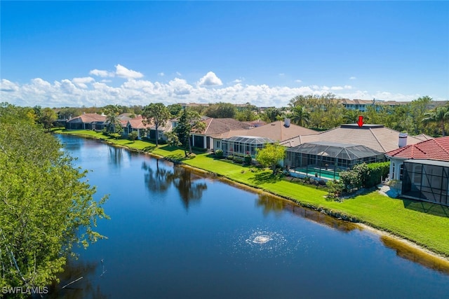 aerial view featuring a residential view and a water view