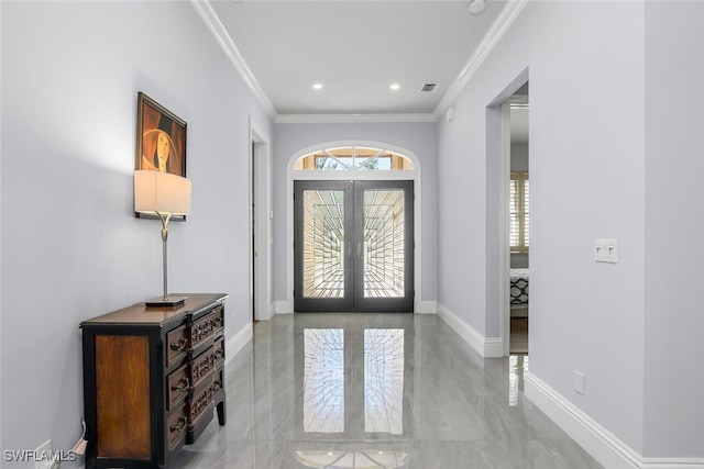 entryway with ornamental molding, french doors, recessed lighting, and baseboards