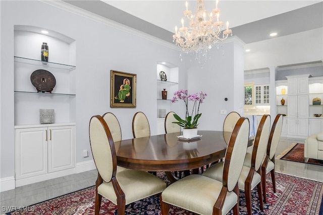 dining space featuring a chandelier, built in shelves, recessed lighting, baseboards, and ornamental molding