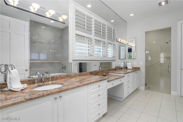 full bath with tile patterned flooring, visible vents, a shower stall, recessed lighting, and vanity
