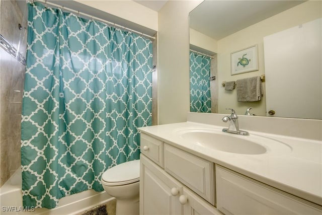 full bath with shower / bath combo, vanity, and toilet