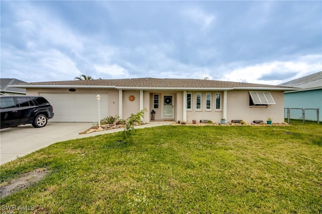 single story home with a garage, fence, concrete driveway, stucco siding, and a front yard