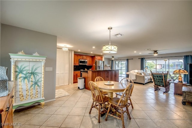 dining space with recessed lighting, visible vents, and light tile patterned flooring