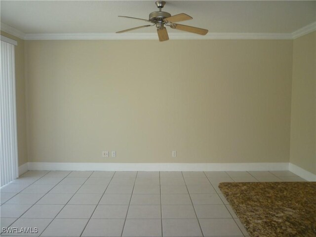 6210 Towncenter Cir, Naples, FL 34119 - spare room featuring ornamental molding, a ceiling fan, baseboards, and light tile patterned floors