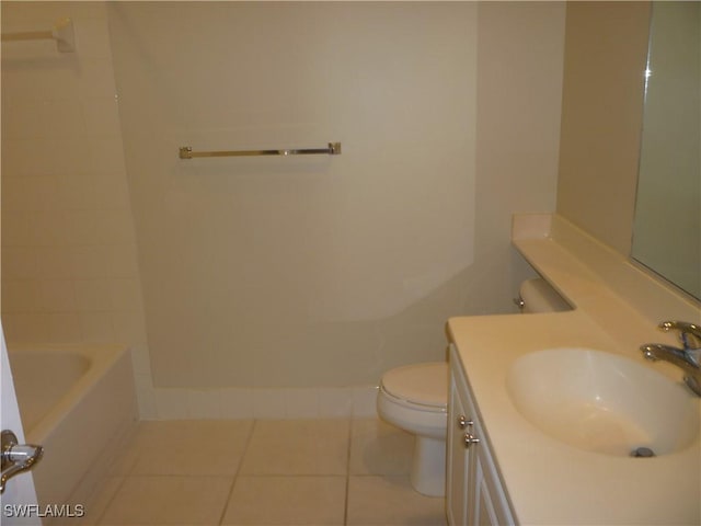 6210 Towncenter Cir, Naples, FL 34119 - full bath with toilet, tile patterned flooring, a tub to relax in, and vanity