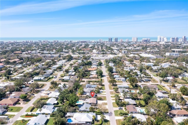 birds eye view of property with a city view