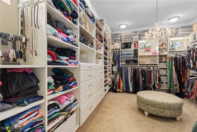 spacious closet with light carpet and a notable chandelier