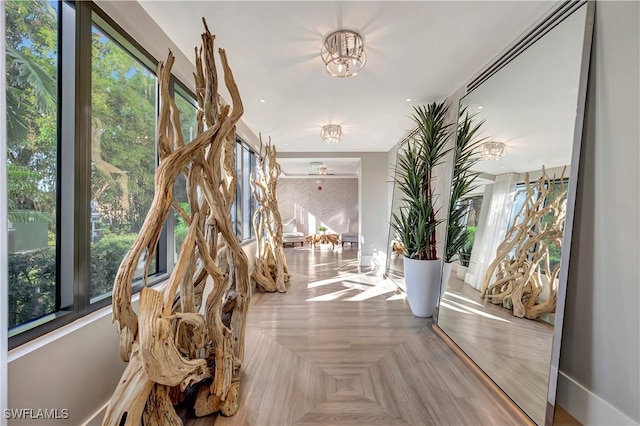 hall with parquet flooring