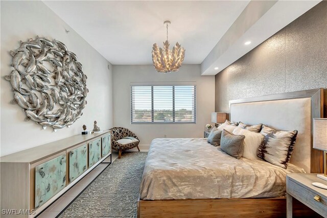 bedroom featuring a chandelier