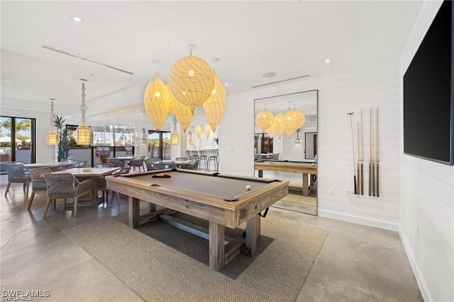 playroom with billiards, lofted ceiling, and concrete floors