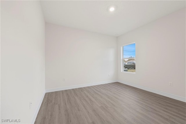 empty room with light wood-type flooring