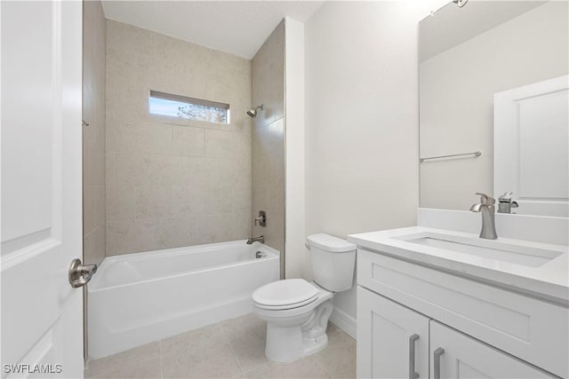 full bathroom with tiled shower / bath combo, vanity, toilet, and tile patterned floors