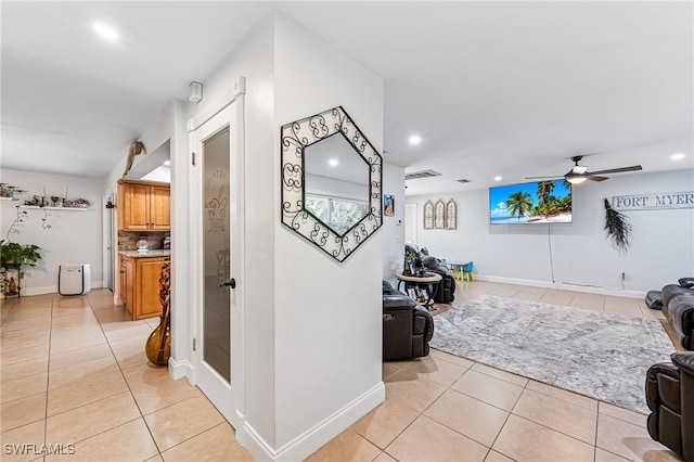 hallway with light tile patterned floors