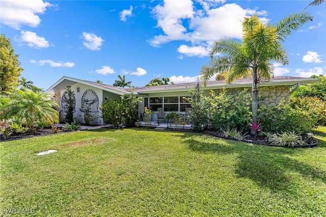 exterior space with a front yard