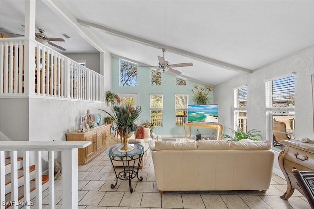 tiled living room featuring vaulted ceiling with beams and a ceiling fan