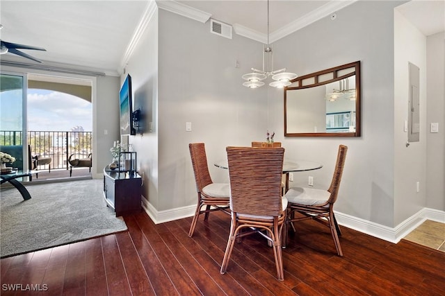 dining space featuring ornamental molding, visible vents, baseboards, and dark wood-style floors