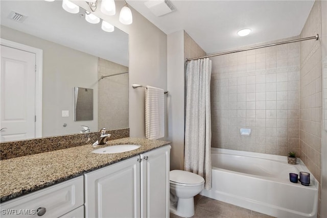 bathroom with tile patterned flooring, toilet, visible vents, vanity, and shower / bath combination with curtain