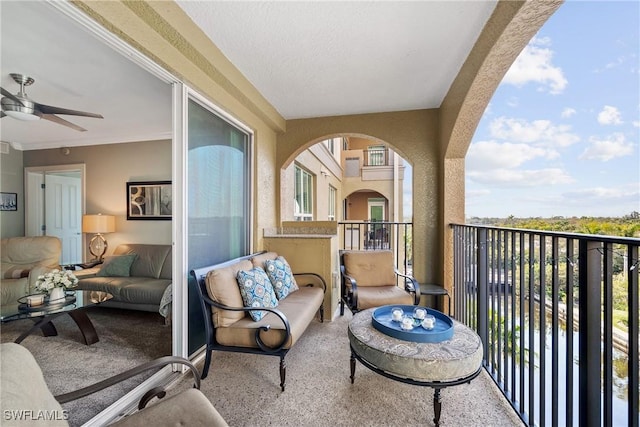 balcony featuring ceiling fan