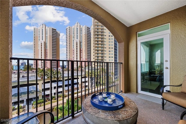 balcony featuring a city view