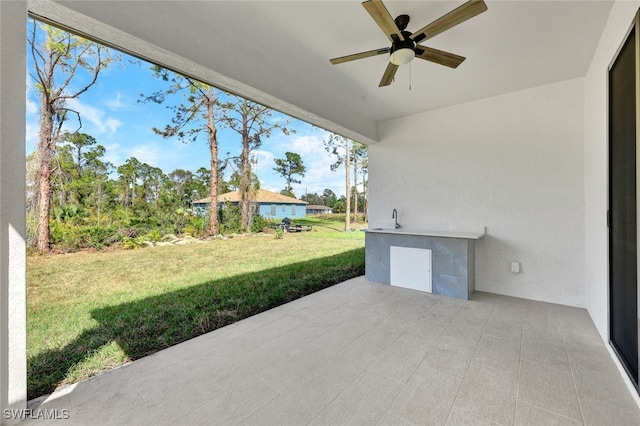 view of patio / terrace with ceiling fan