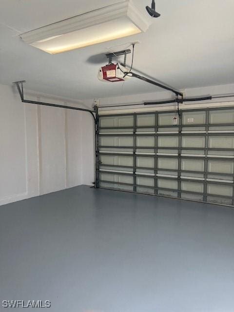 garage featuring a garage door opener