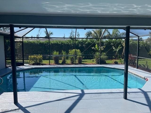 pool featuring a patio area and a lanai