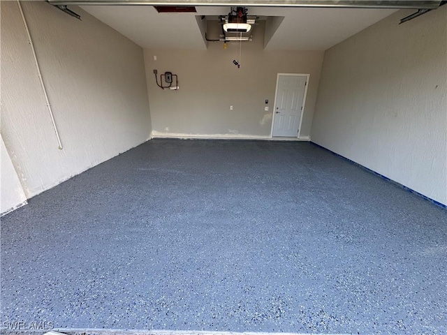 2810 27th St SW, Lehigh Acres, FL 33976 - garage with a garage door opener