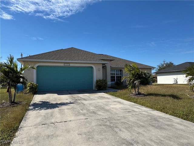 ranch-style home with a garage and a front lawn